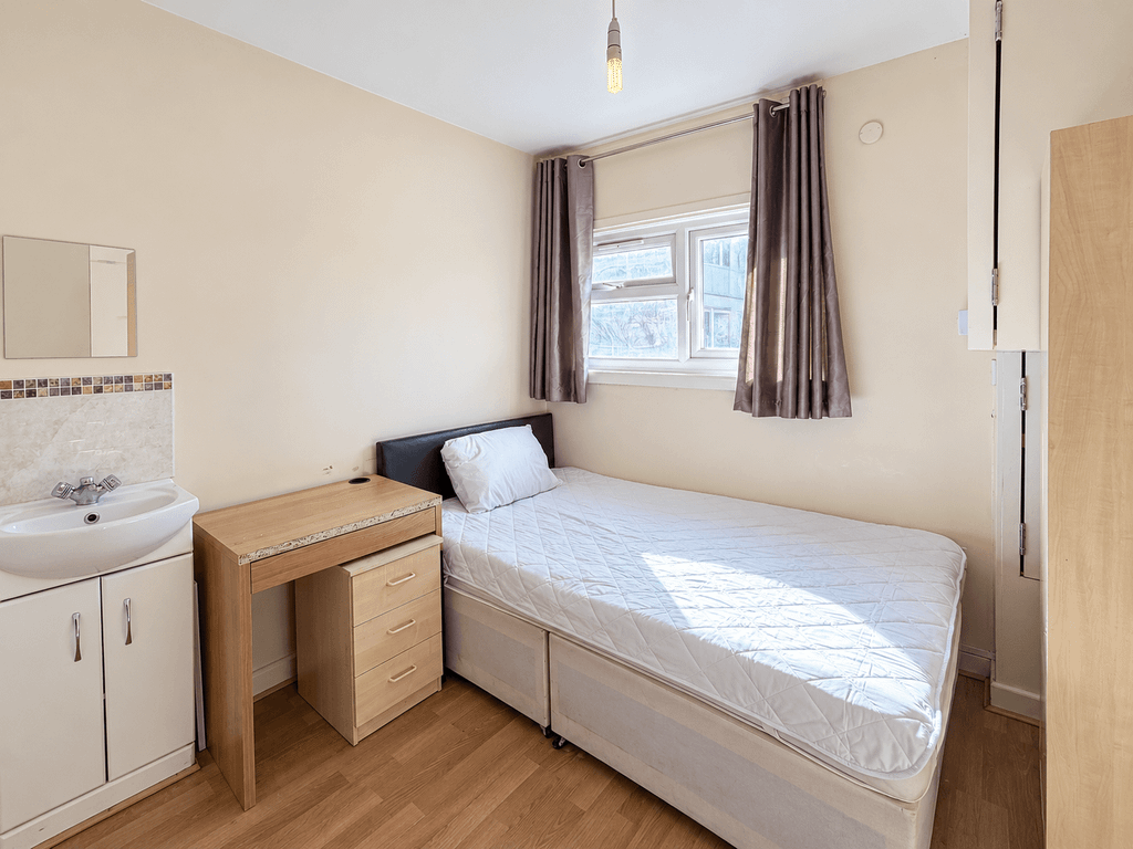 Property photo 3 of 7 Bright, Natural-Light Bedroom Listing