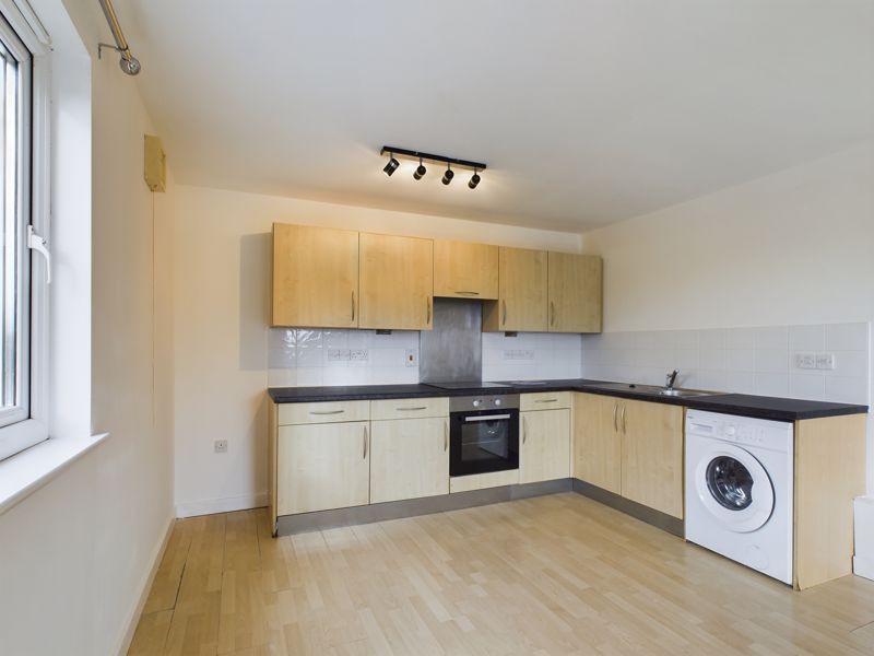 Property photo 2 of 9 Kitchen Area