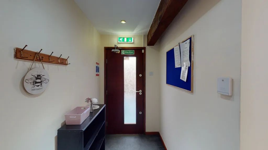 Property photo 2 of 13 A Tidy And Inviting Hallway With Ample Natural Lig...