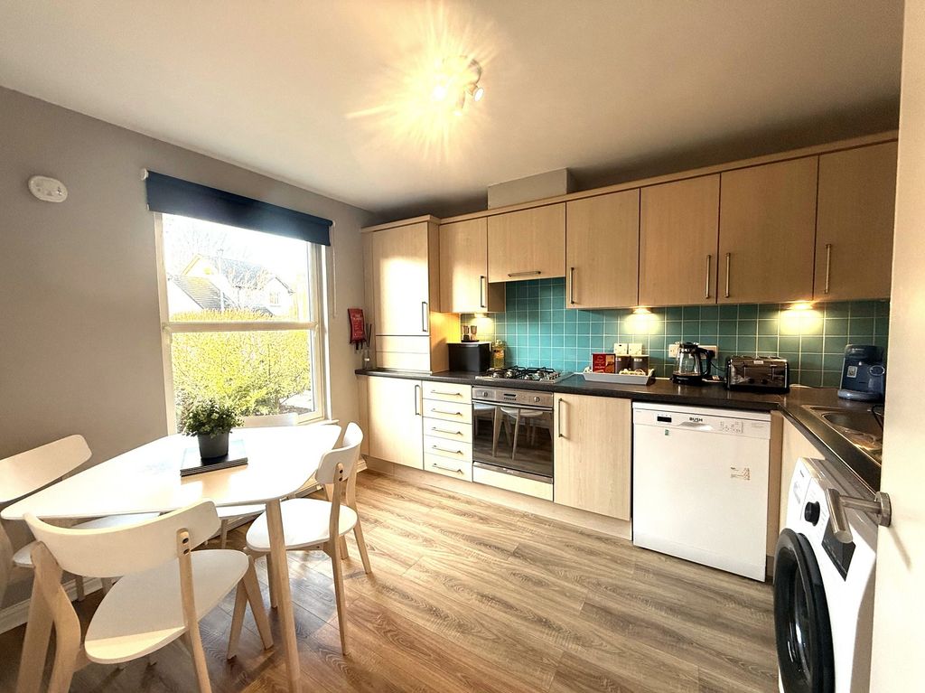 Property photo 3 of 8 Kitchen