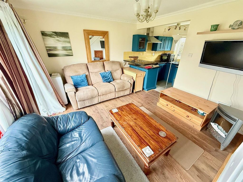 Property photo 3 of 7 Living Area & Kicthe.Jpg