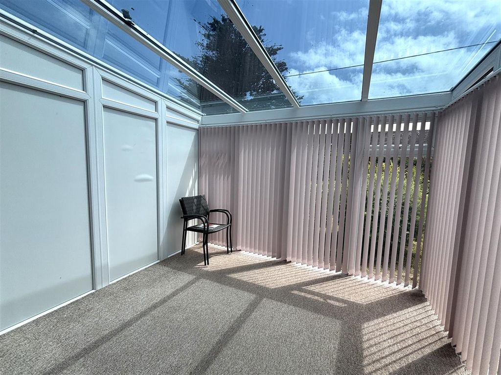 Property photo 3 of 8 Conservatory
