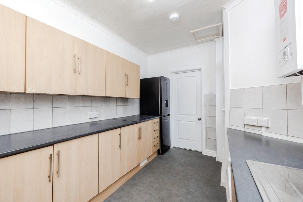 Property photo 2 of 12 Kitchen