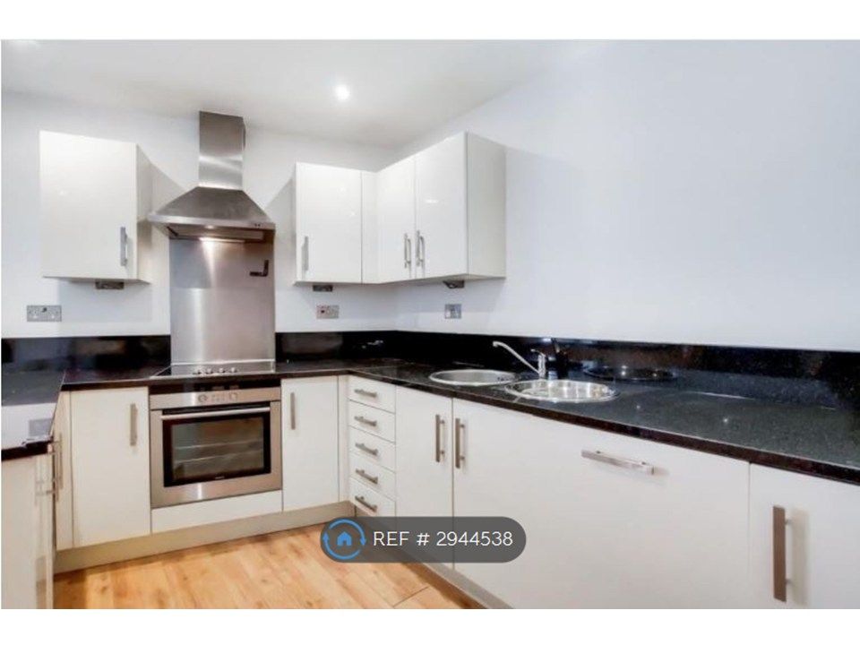 Property photo 2 of 9 Integrated Kitchen