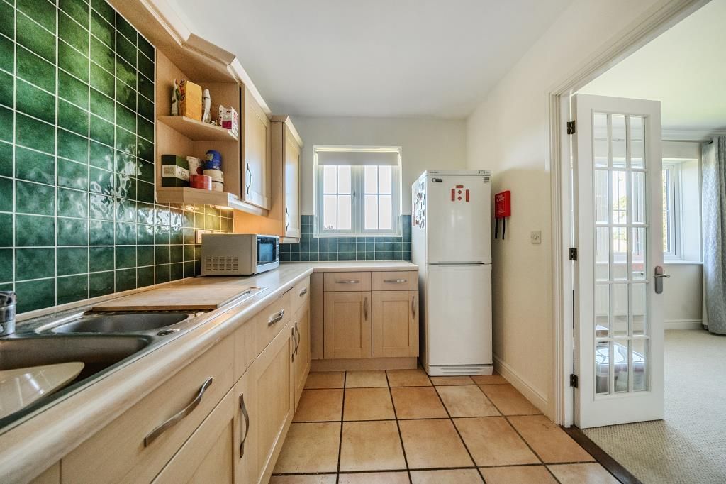 Property photo 3 of 12 Kitchen