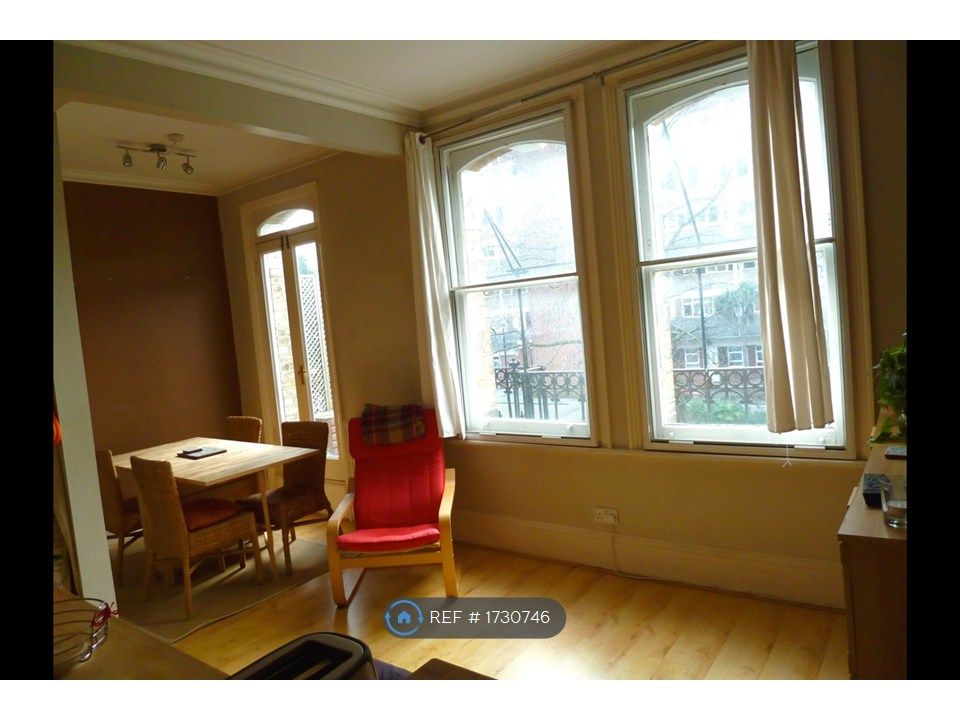 Property photo 3 of 8 Dining/Lounge Area