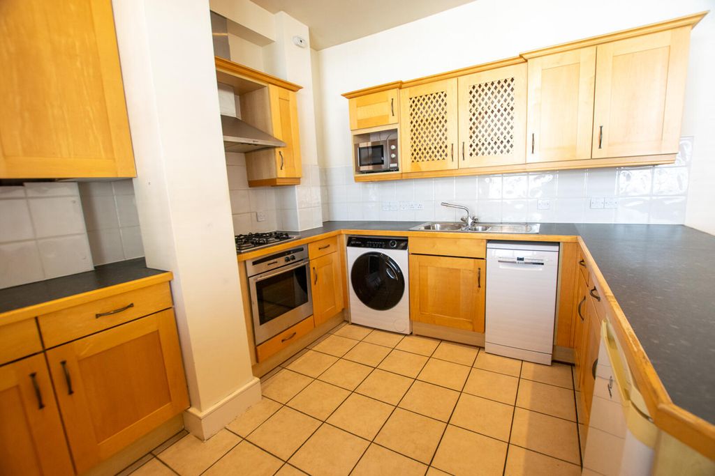 Property photo 3 of 13 Kitchen