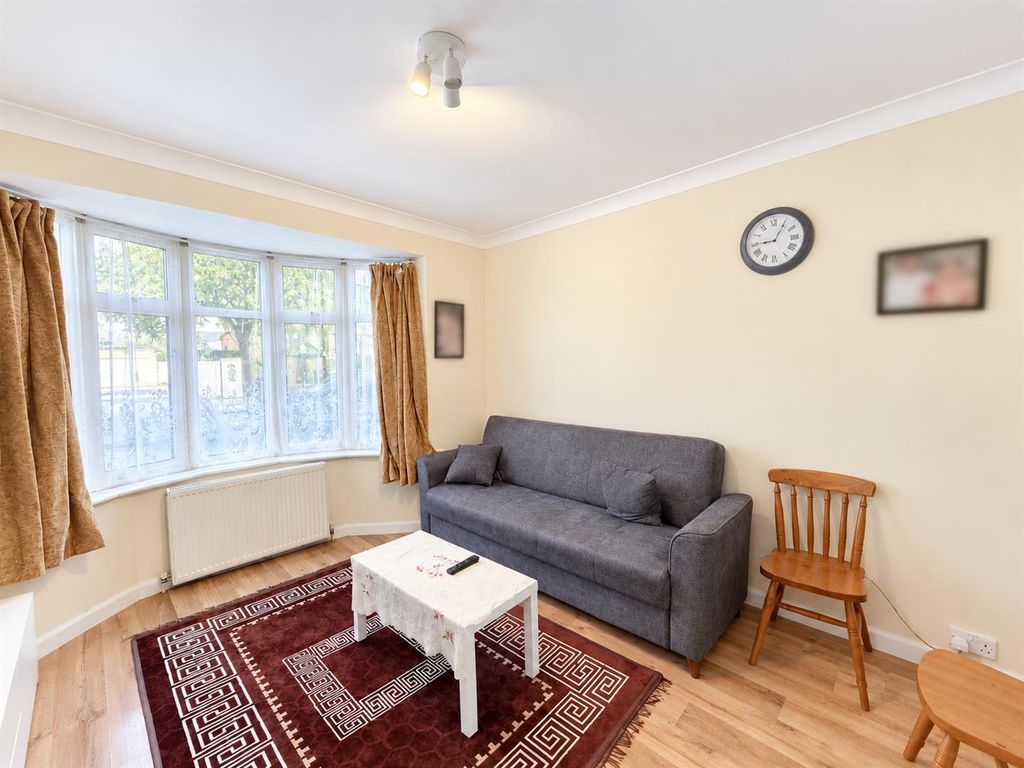 Property photo 3 of 11 Bright Cozy Living Room With Blurred Wall Art.Png