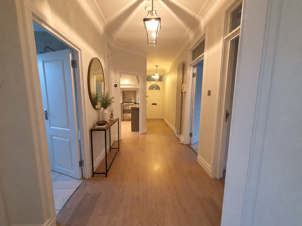 Property photo 3 of 14 Hallway With Console And Greenery