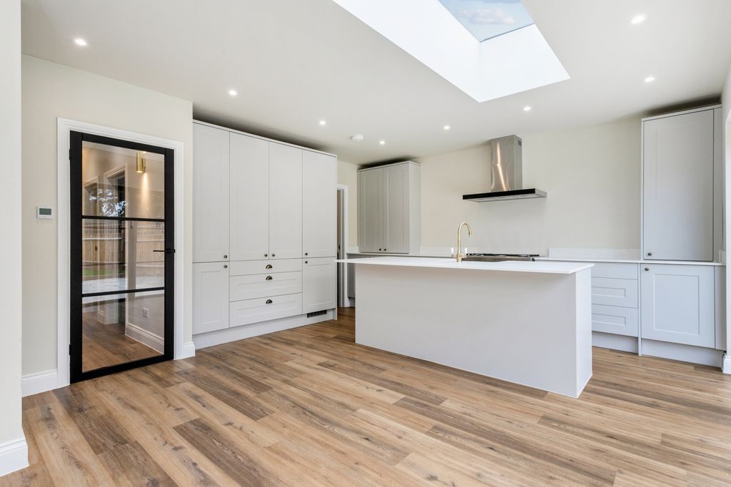 Property photo 2 of 26 Kitchen Area