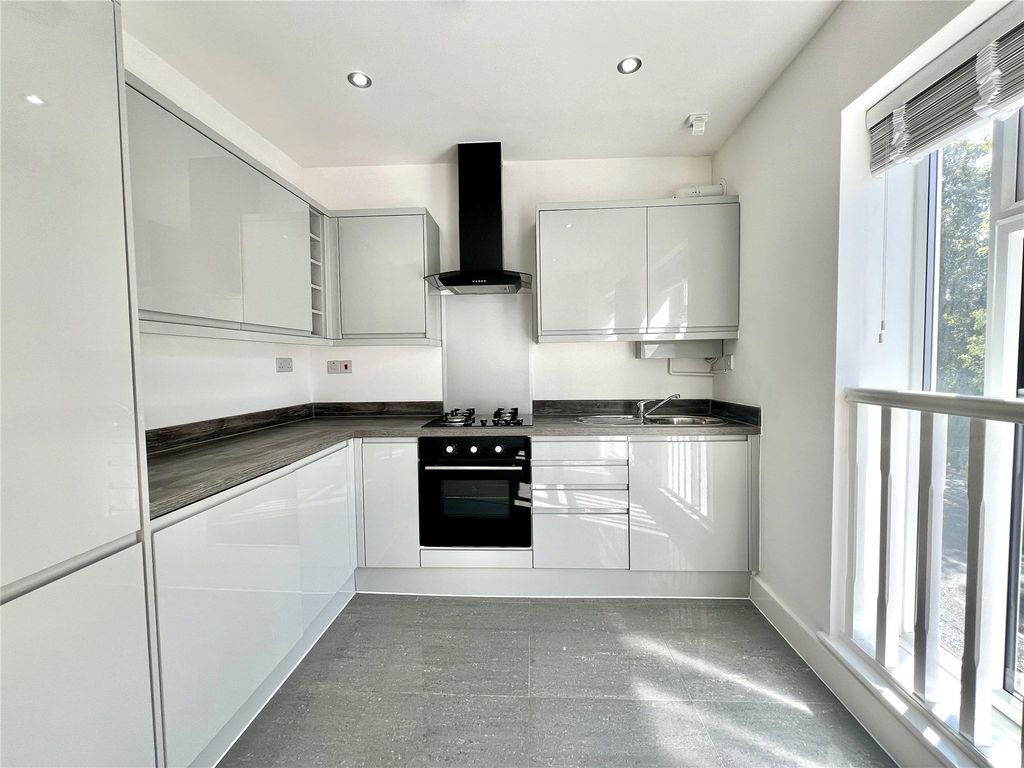 Property photo 2 of 11 Kitchen Area