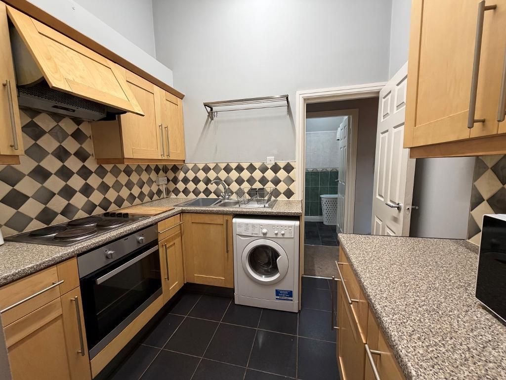 Property photo 2 of 9 Kitchen