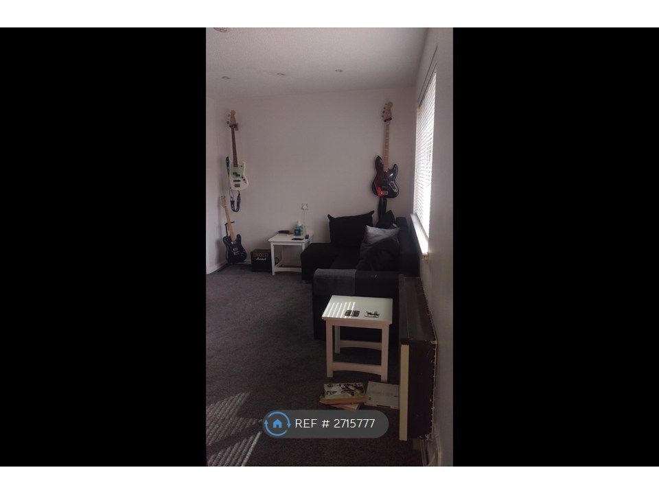 Property photo 2 of 8 Living Area