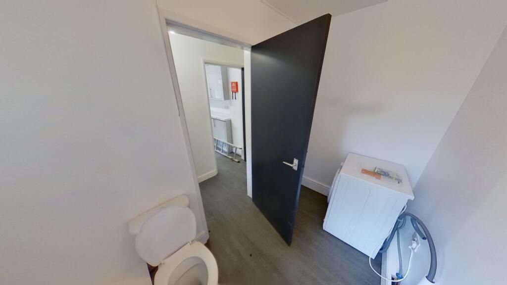 Property photo 1 of 11 A Clean And Simple Single Toilet Room Featuring A ...
