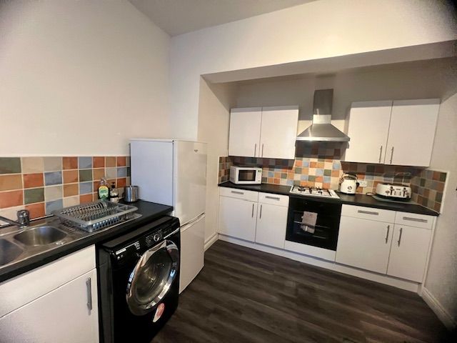 Property photo 2 of 7 Kitchen