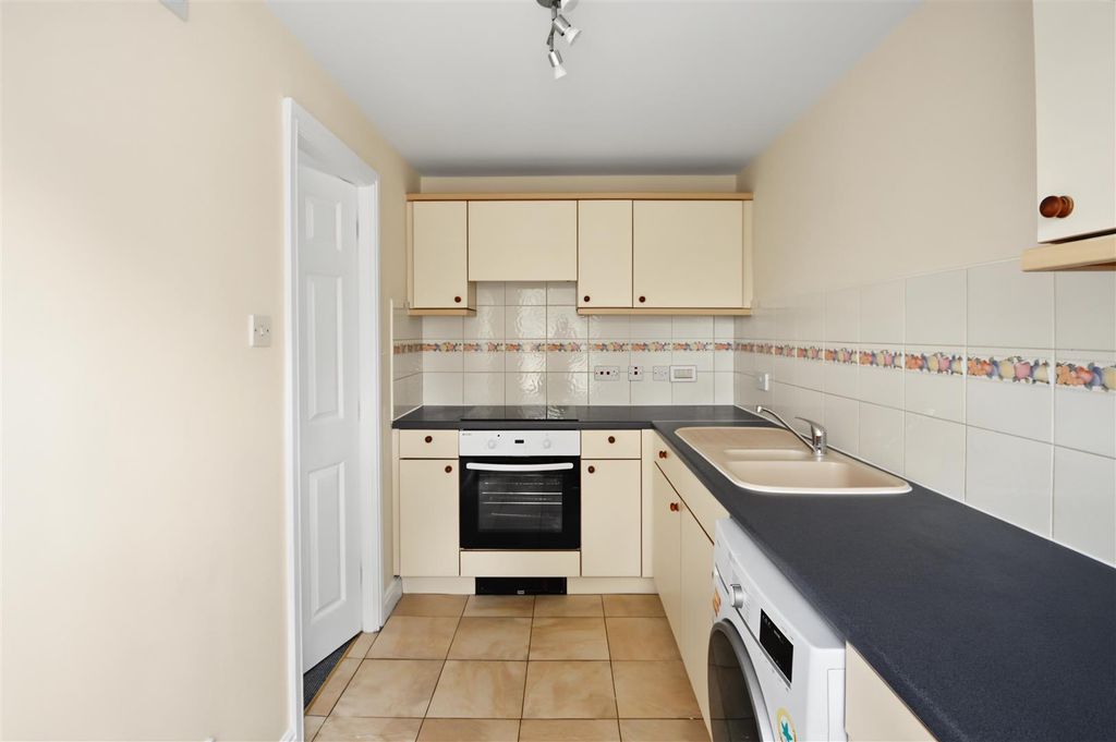 Property photo 3 of 12 Kitchen