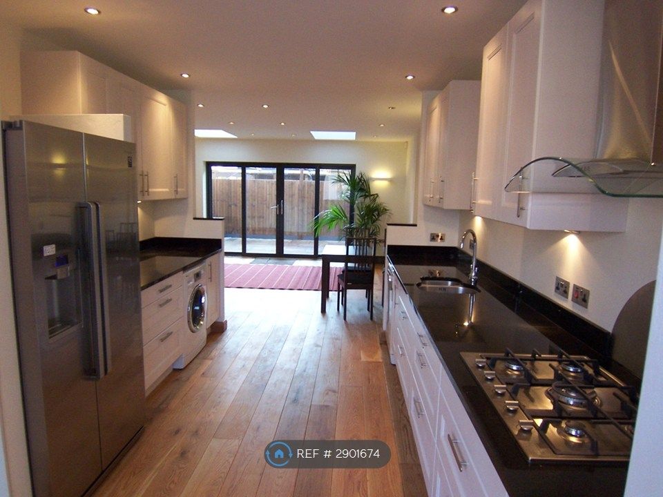 Property photo 2 of 11 Kitchen Area
