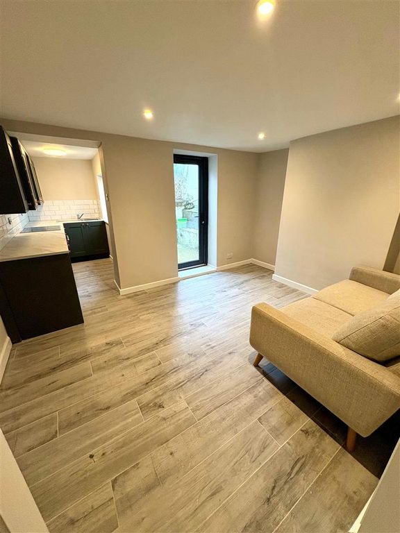 Property photo 3 of 10 Living Area.Jpg