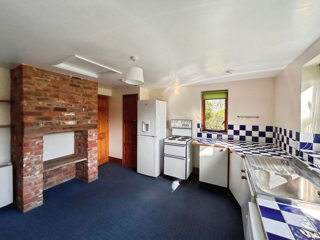 Property photo 2 of 12 Kitchen