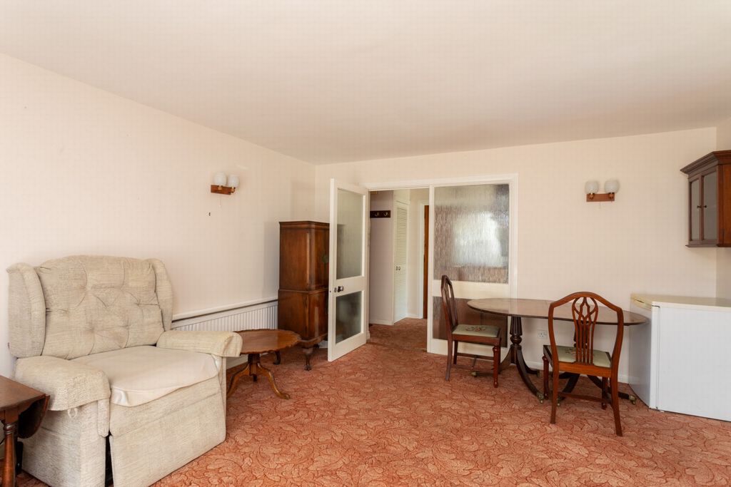 Property photo 3 of 12 Living Space
