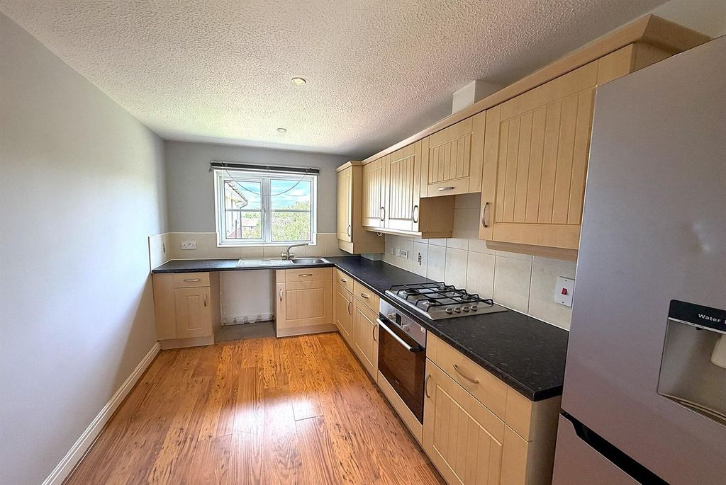 Property photo 2 of 9 Bright Kitchen With Ample Counter Space And Oven...