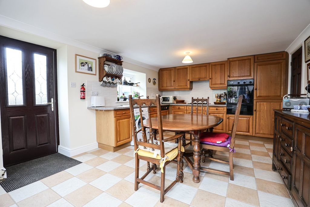 Property photo 3 of 13 Dining Kitchen