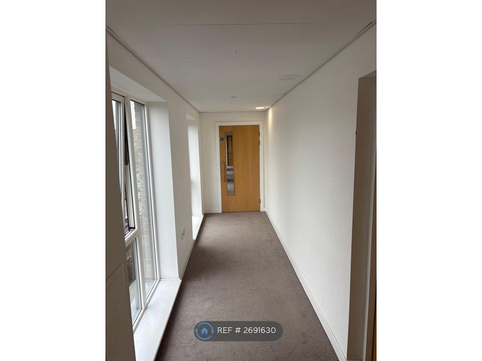 Property photo 2 of 13 Hallway To Apartment