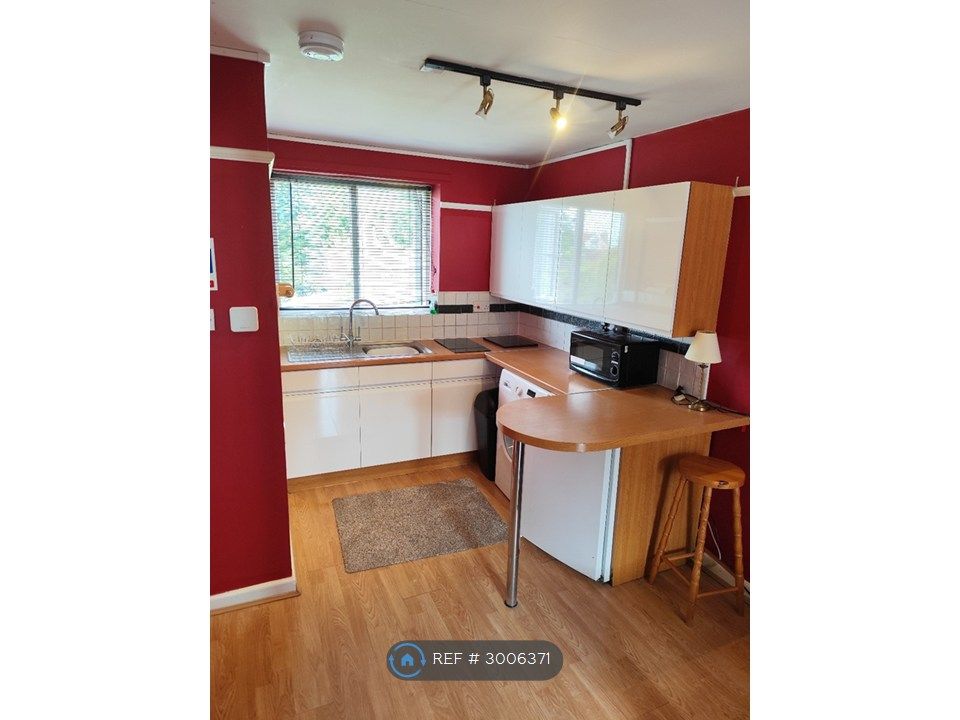Property photo 2 of 9 Kitchen With Breakfast Bar