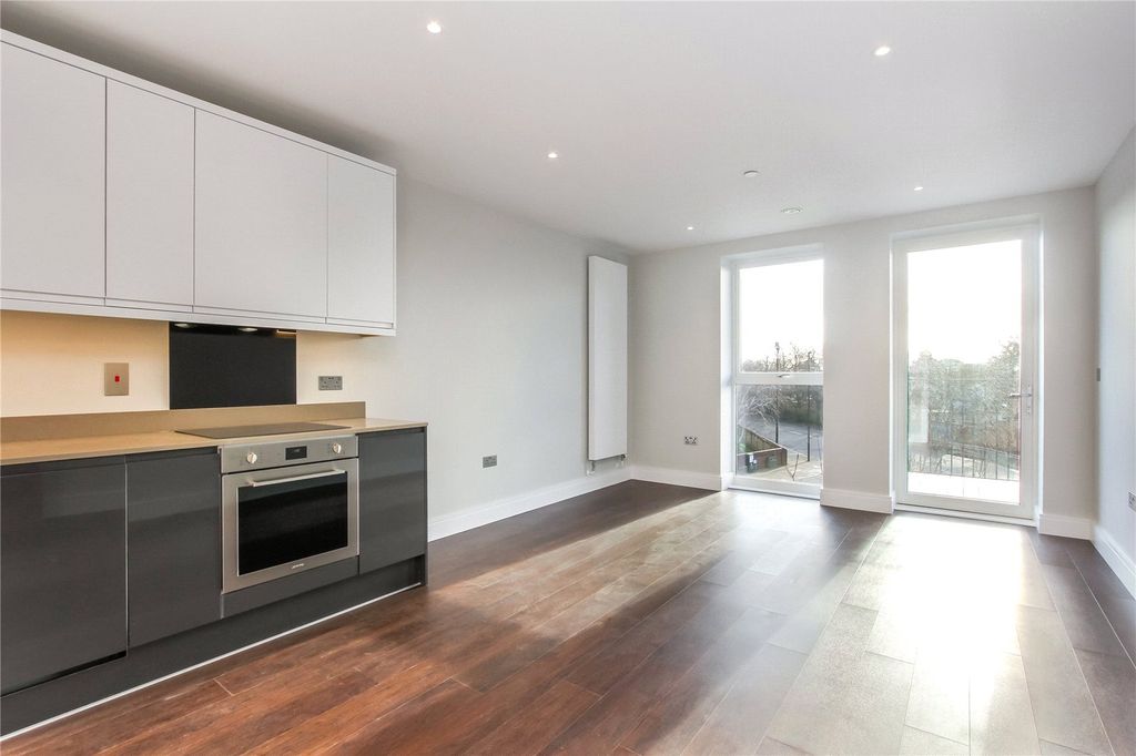 Property photo 1 of 9 Kitchen/Living Area