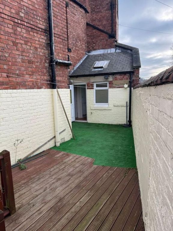 Property photo 2 of 9 A Charming Outdoor Garden Space Featuring A mix Of...