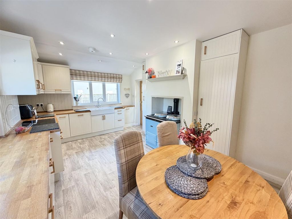 Property photo 2 of 54 Dining Kitchen