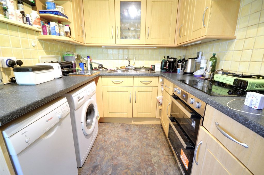 Property photo 3 of 12 Kitchen
