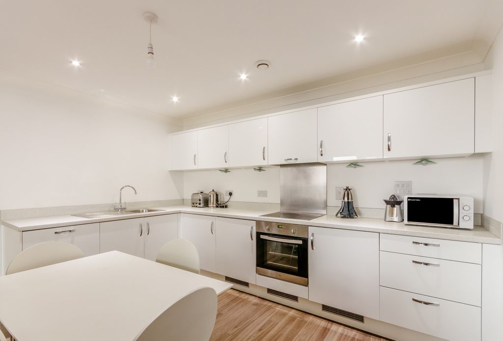 Property photo 3 of 8 Kitchen