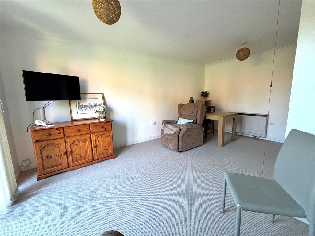 Property photo 2 of 12 Living