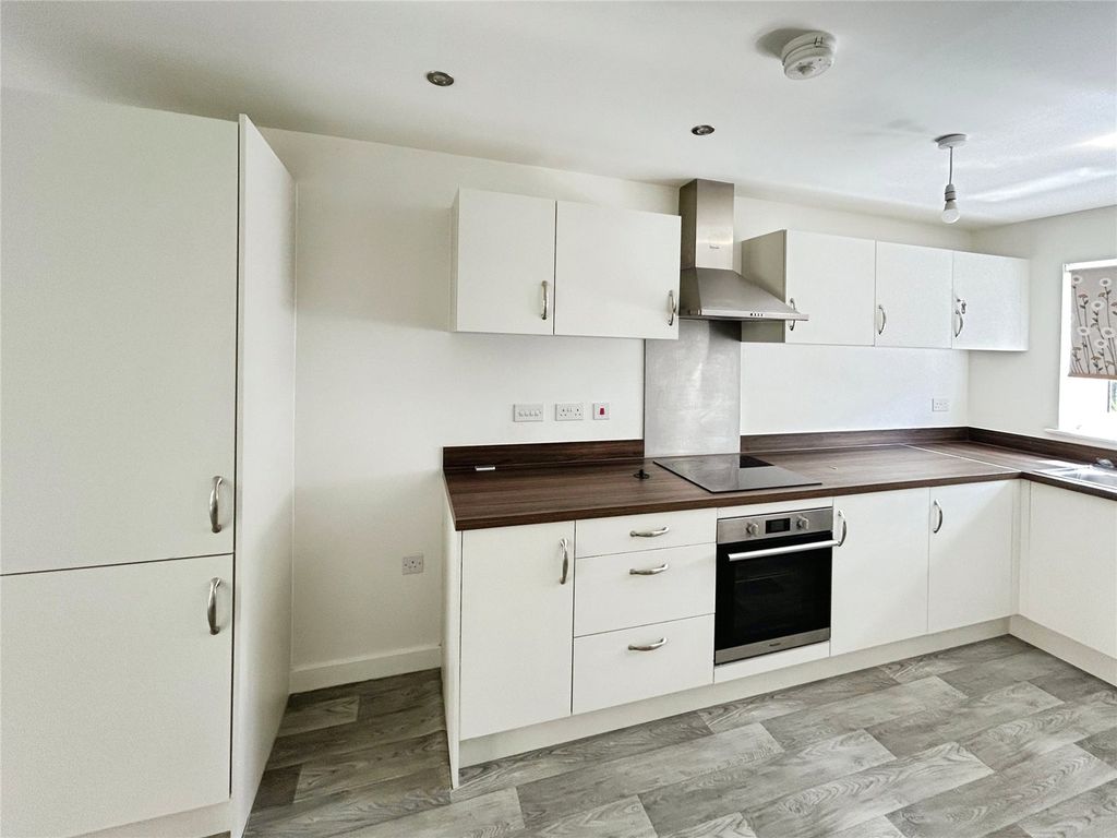 Property photo 2 of 10 Kitchen Area