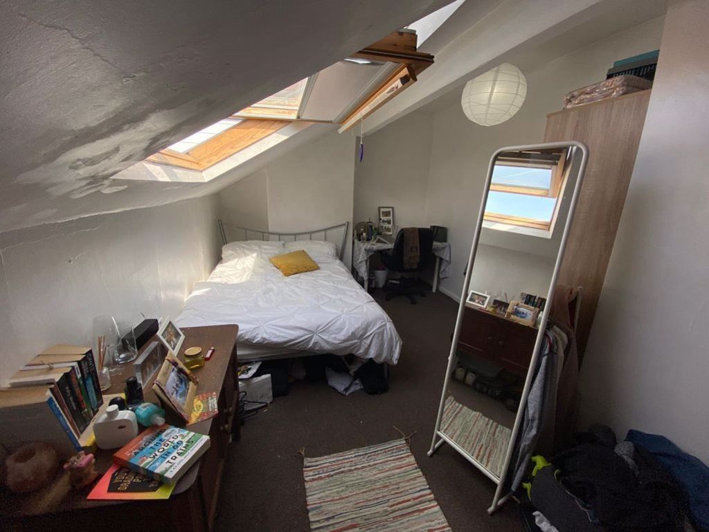 Property photo 3 of 16 A Cozy Bedroom Featuring A Double Bed, A Standing ...