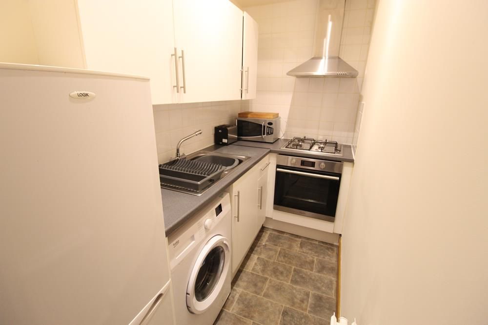 Property photo 3 of 7 Kitchen