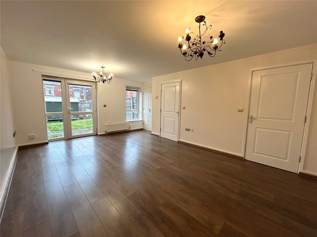 Property photo 2 of 12 Living Area