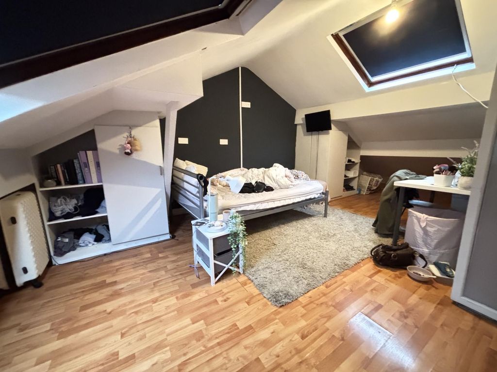 Property photo 2 of 10 A Cozy Bedroom With A Stylish Bed Frame, Natural l...