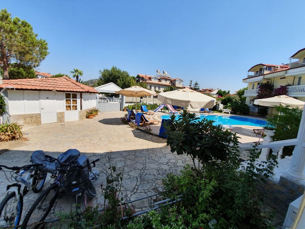 Property photo 3 of 11 A Lovely Ground-Floor Apartment In Dalyan For Sale - Communal Pool And Amenities