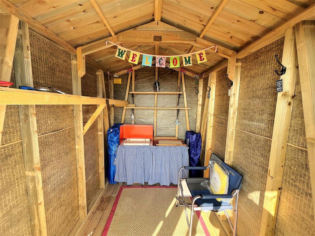 Property photo 2 of 8 Beach Hut 44 - Interior1.Jpg