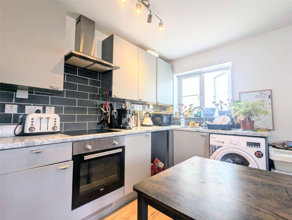 Property photo 2 of 6 Kitchen Area