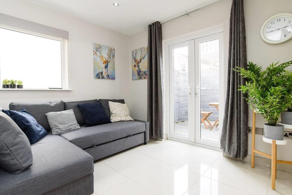 Property photo 2 of 21 Bright Lounge With Patio Doors And Comfy Sofa...