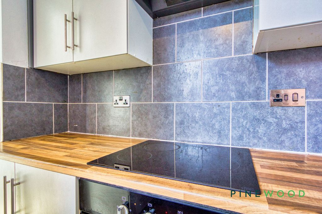 Property photo 3 of 12 Kitchen