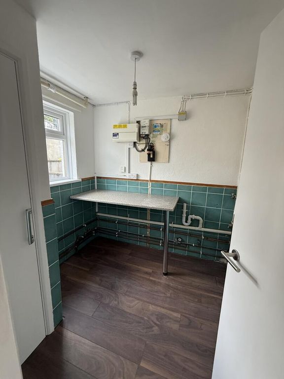 Property photo 2 of 11 Utility Room