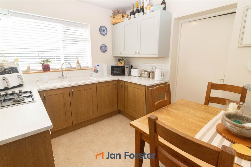 Property photo 3 of 12 Kitchen