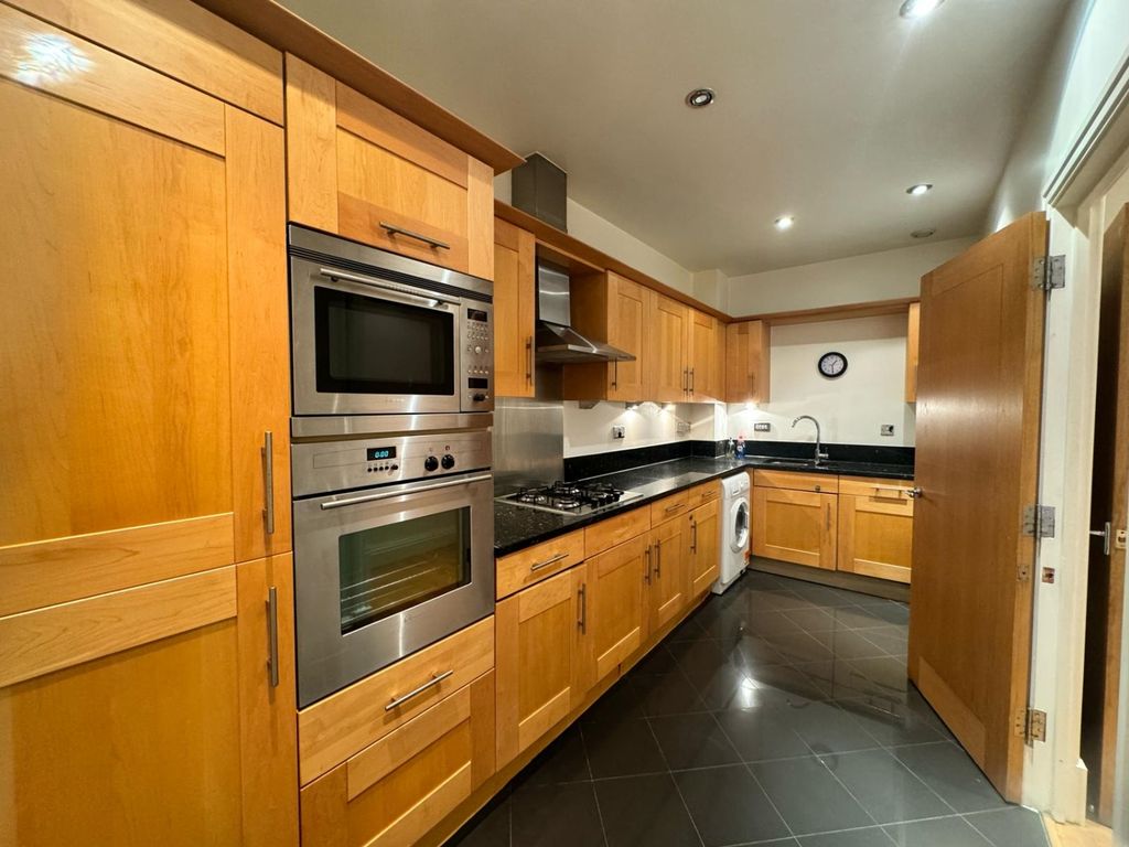 Property photo 3 of 9 Kitchen