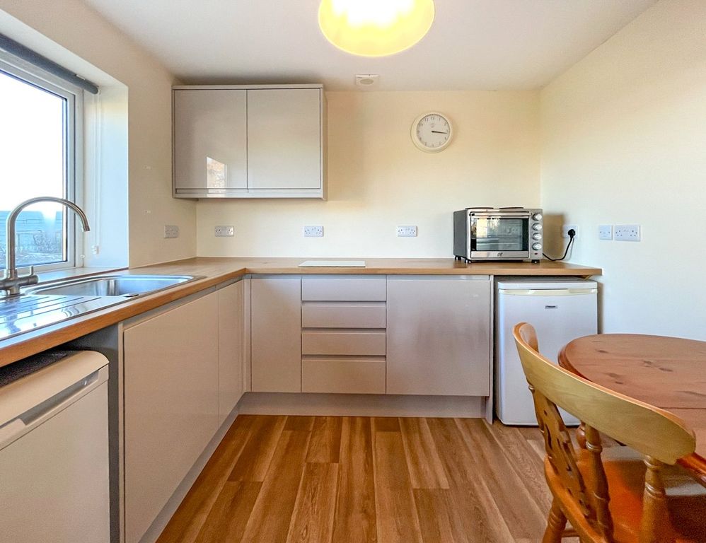 Property photo 2 of 9 Kitchen