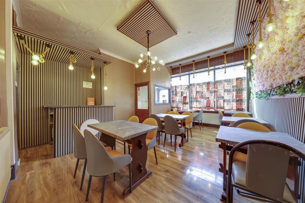 Property photo 2 of 12 Bar / Restaurant Area