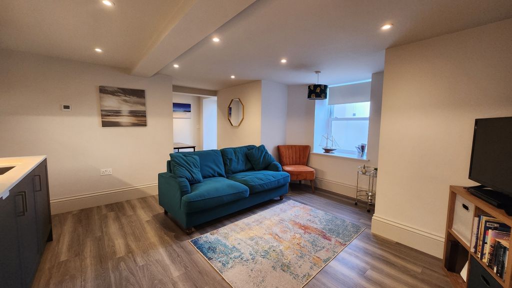Property photo 2 of 12 Living Area